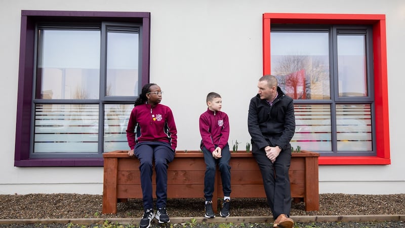 Principal Tiernan O’Neill with fifth class pupils, Semilore Ade-John and Aaron Troy Conway. Photograph: Alan Place