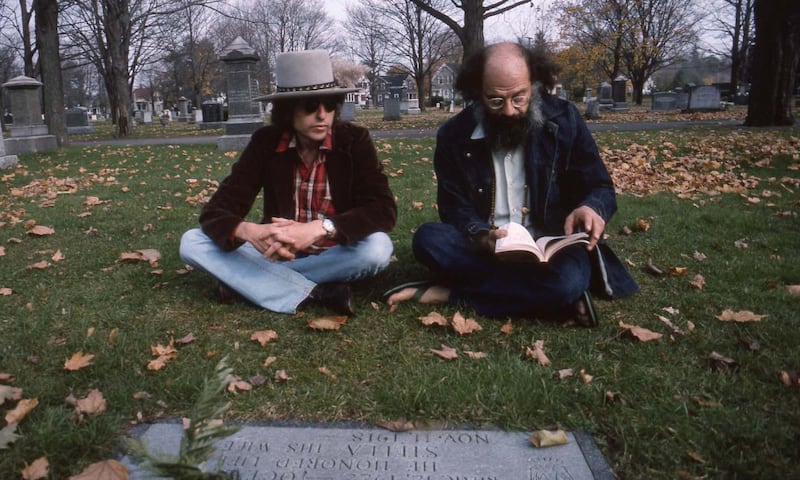 Rolling Thunder Revue: Bob Dylan and Allen Ginsberg at Jack Kerouac’s grave. Photograph: Netflix