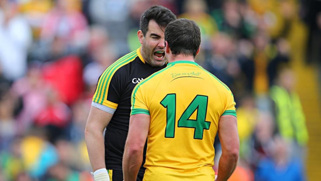 Donegal goalkeeper Paul Durcan celebrates with his  captain Michael Murphy after the final whistle at Celtic Park.