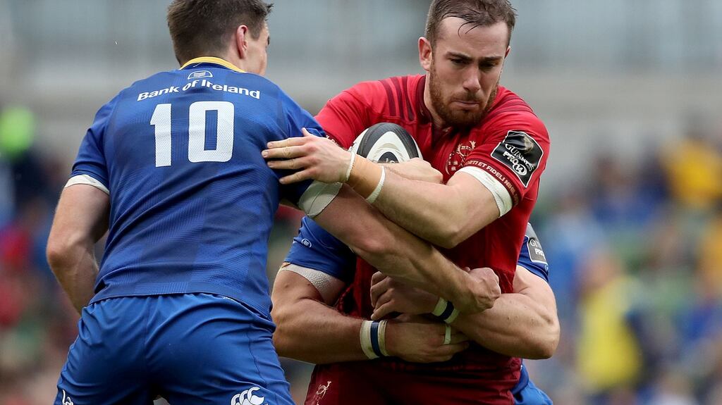 Munster’s JJ Hanrahan is tackled by Johnny Sexton at the Aviva Stadium. Photograph: Dan Sheridan/Inpho
