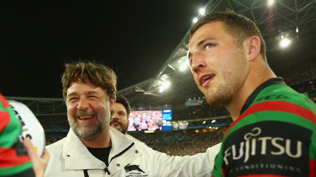 Rabbitohs co-owner Russell Crowe speaks to Sam Burgess after victory during the 2014 NRL Grand Final in SydneyPhotograph: Mark Kolbe/Getty Images