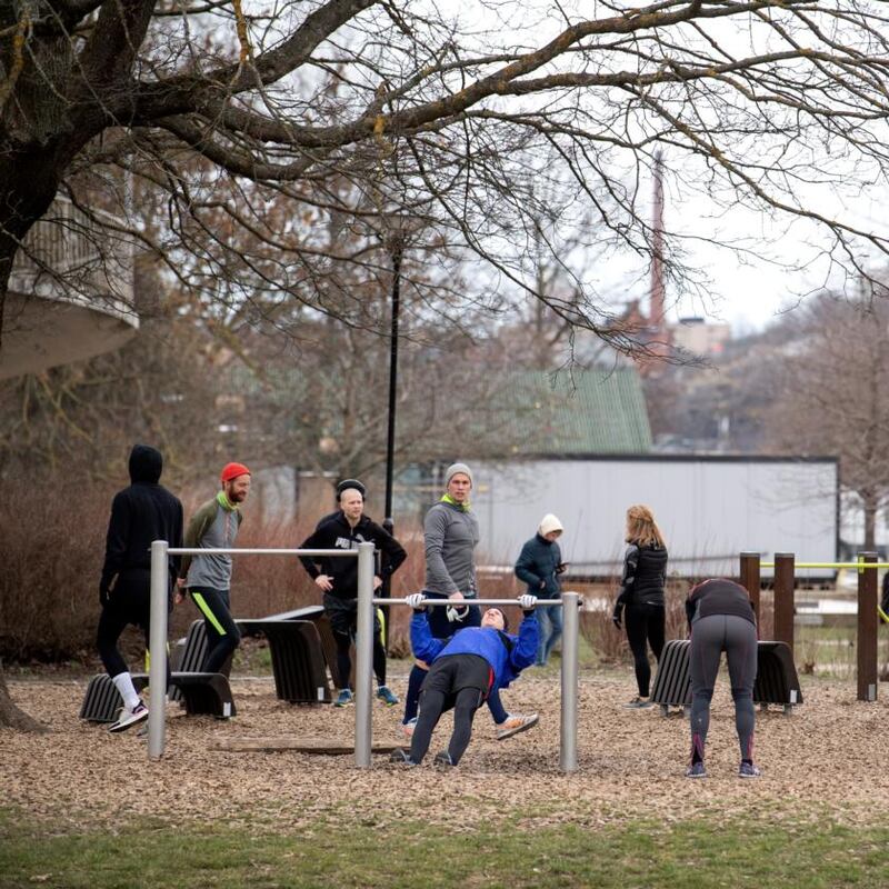 Social distancing?: people exercising in a park in Stockholm on Wednesday. Photograph: Jessica Gow/EPA