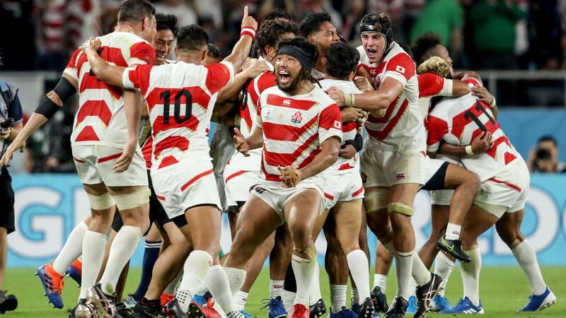 Japan players celebrate their victory over Ireland in Shizuoka. Photograph: Dan Sheridan/Inpho