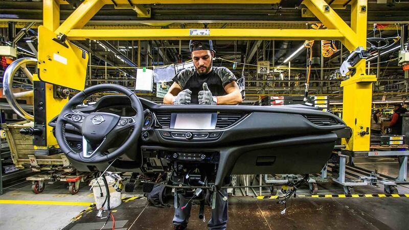 Over two shifts per day, 800 staff on the line convert metal shells into recognisable cars.