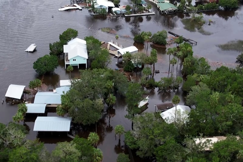 Homes surrounded by floodwaters in Steinhatchee, Florida. Photograph:(Daniel Kozin/AP