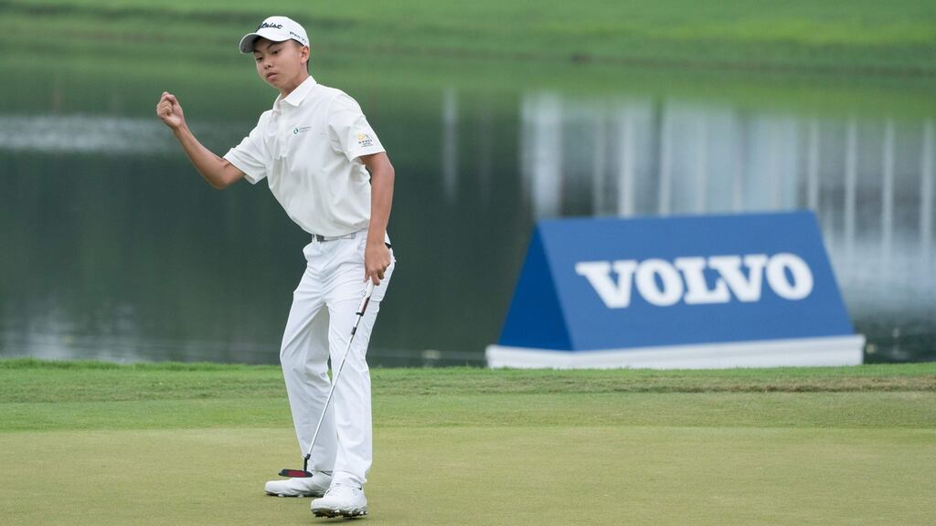 Fourteen year-old Kuang Yang of China reacts after a putt during the second round of the China Open in Shenzhen. Photo: Getty Images