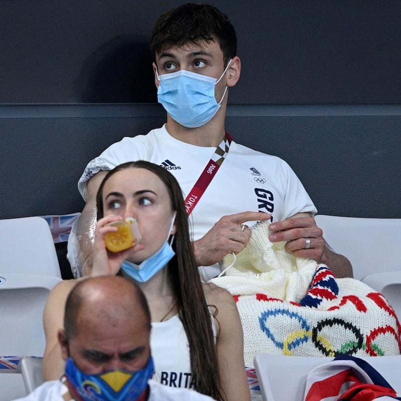 Daley knitting in the stands at the Tokyo Olympics. Photograph: Oli Scarff/AFP via Getty