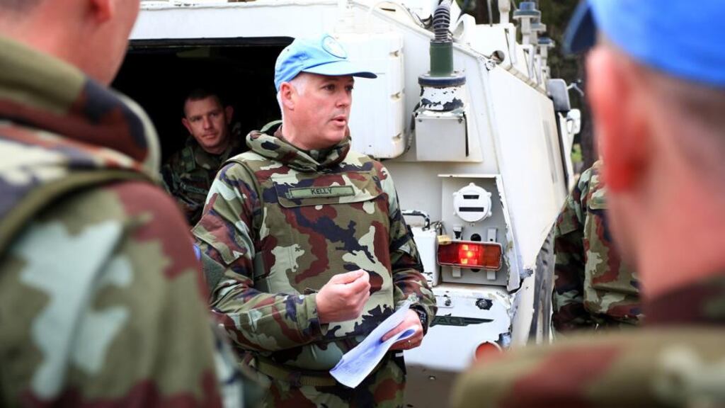 Company commander Comdt Paul Kelly briefing his men before the platoon rotation at UN post 80. “The mission is to ride in a fast, effective and orderly manner,” he tells his section commanders