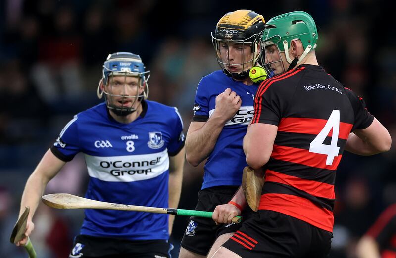Sarsfields’ Daniel Hogan and Tadhg Foley of Ballygunner tussle during the Munster club final in Thurles. Photograph: James Crombie/Inpho
