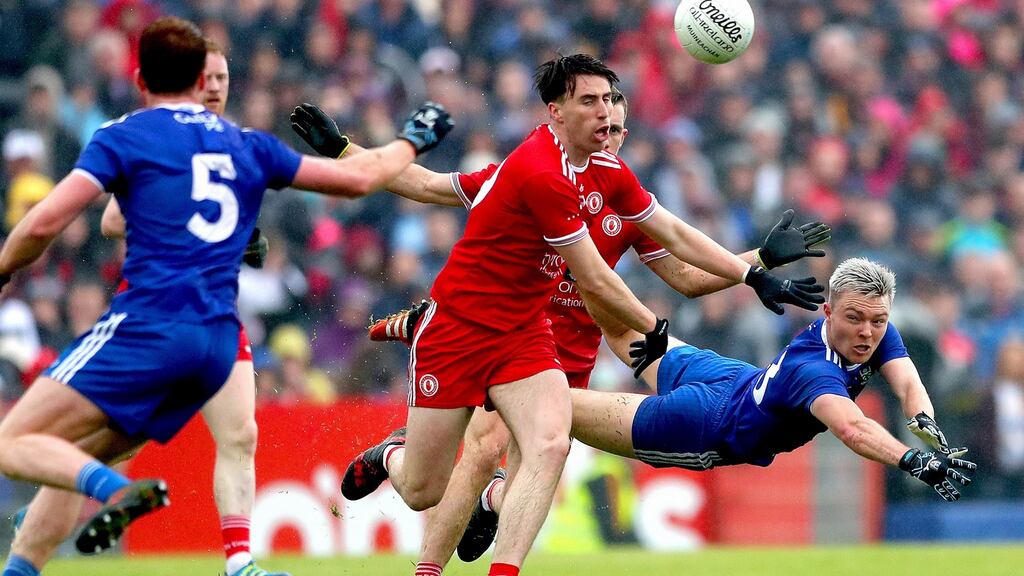 Tyrone’s Conall McCann in action against Monaghan’s Conor McCarthy at Healy Park. Photograph: James Crombie/Inpho
