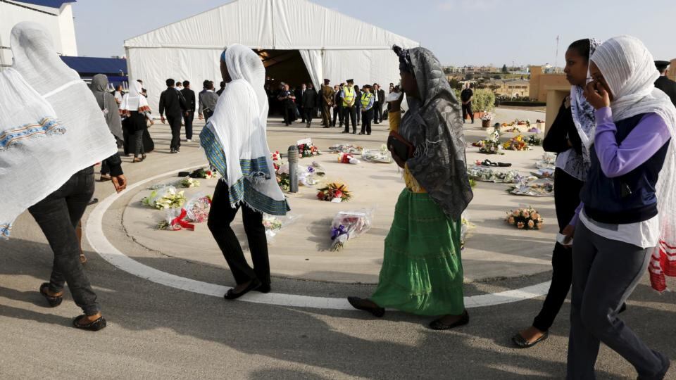 Migrants arrive for the inter-faith burial service. European Union leaders who decided last year to halt the rescue of migrants trying to cross the Mediterranean are expected to reverse their decision on Thursday at a summit hastily convened after nearly 2,000 people died at sea. Photograph: Darrin Zammit Lupi/Reuters