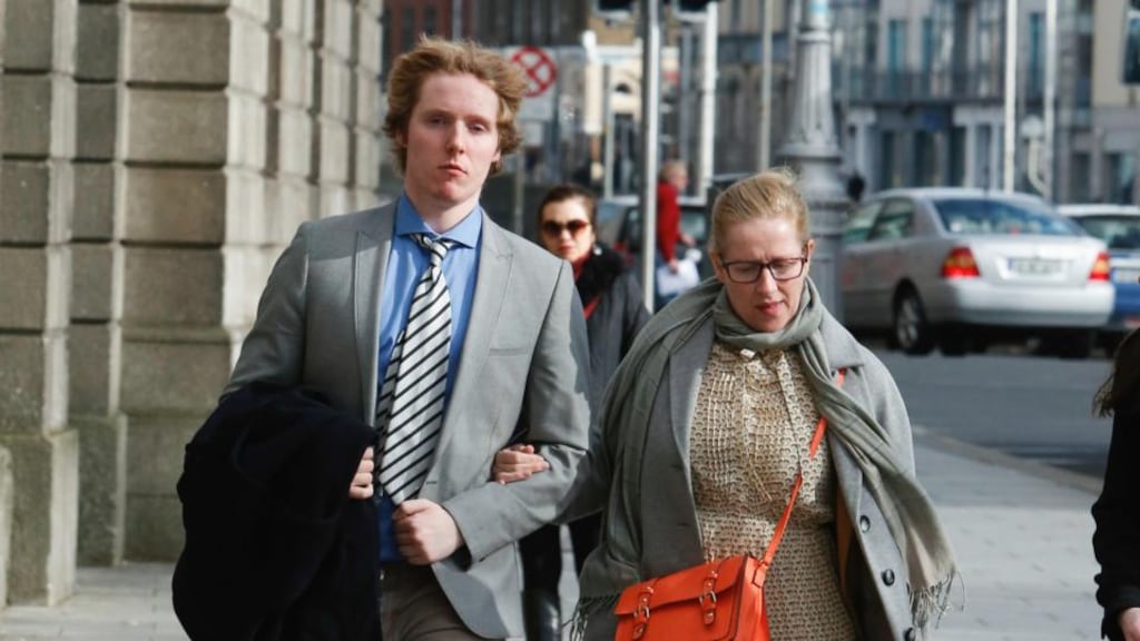 Lucas Neville and his mother Michelle Neville outside  the High Court in  Dublin today.  Photograph: Gareth Chaney Collins