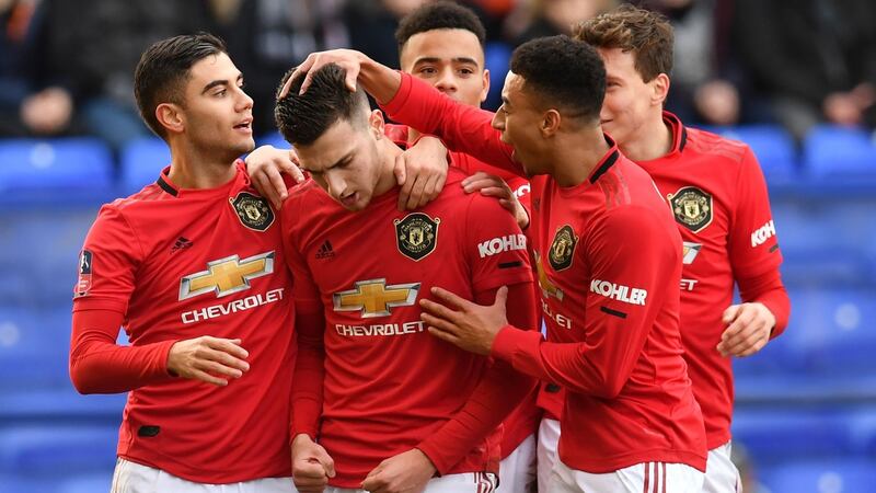 Diogo Dalot celebrates after scoring Manchester United’s second against Tranmere. Photograph: Paul Ellis/Getty/AFP