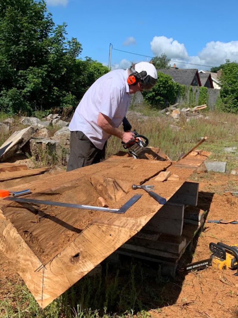 Emmet Kane carving out the center of the sculpture from Irish Green Oak at his studio in Castledermot. Pic Fran Morrin