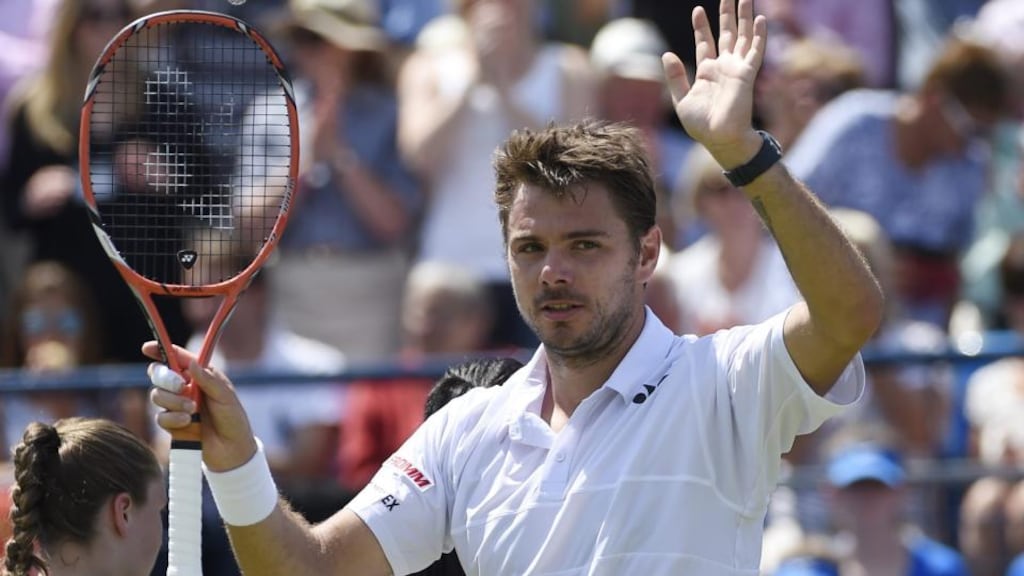 Stan Wawrinka of Switzerland celebrates beating Nick Kyrgios in the first round of the Aegon tennis championships at the Queens Club. Photograph: Facundo Arrizabalaga/EPA