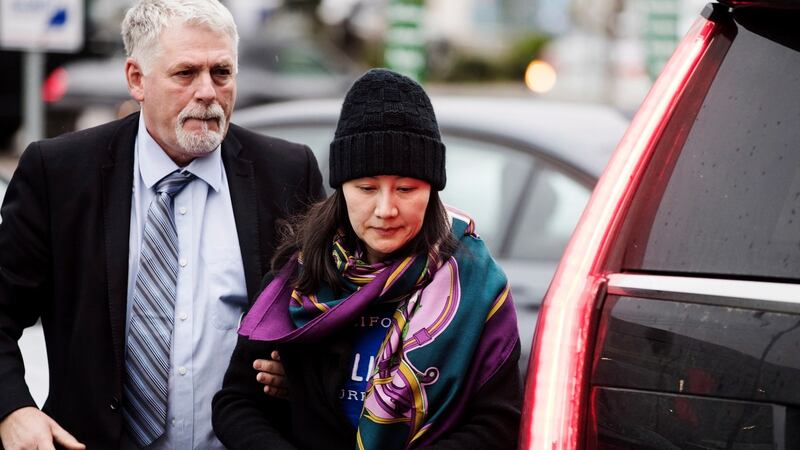 Huawei chief financial officer Meng Wanzhou arrives at a parole office with a security guard in Vancouver, Canada, last week. Photograph: The Canadian Press