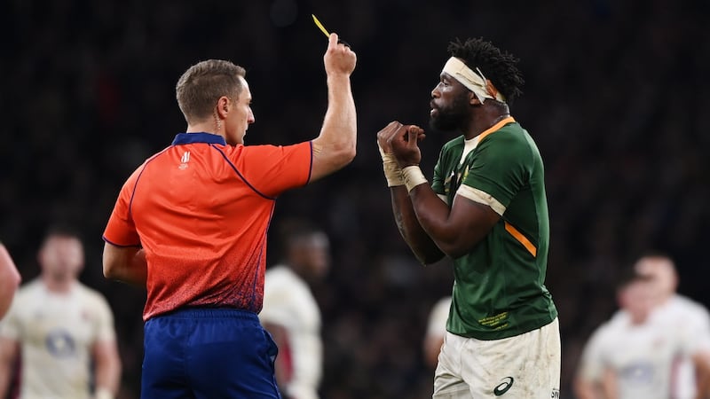 Siya Kolisi of South Africa receives a yellow card from referee Andrew Brace during the Test match against England in London. File photograph: EPA