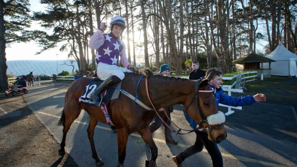 Jockey Brian Hughes celebrates onboard Katie T after winning the BoyleSports Hurdle. Photograph: Morgan Treacy/Inpho