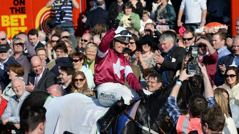 Katie Walsh celebrates winning the Irish Grand National on Thunder and Roses at Fairyhouse on Easter Monday. Photograph Cyril Byrne/The Irish Times