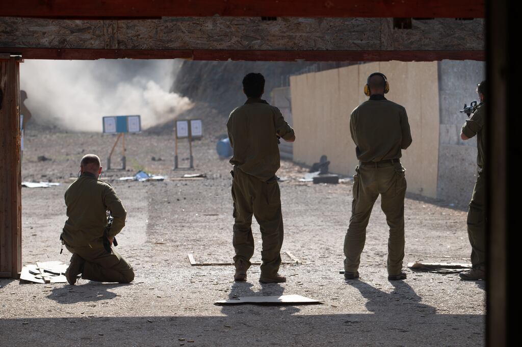 Israeli civilians undergo training after receiving weapons at a distribution point for civilians, at the Kibbutz of Ayyelet HaShahar in the Upper Galilee, northern Israel close to the border with Lebanon, on Thursday. Photograph: Ayal Margolin