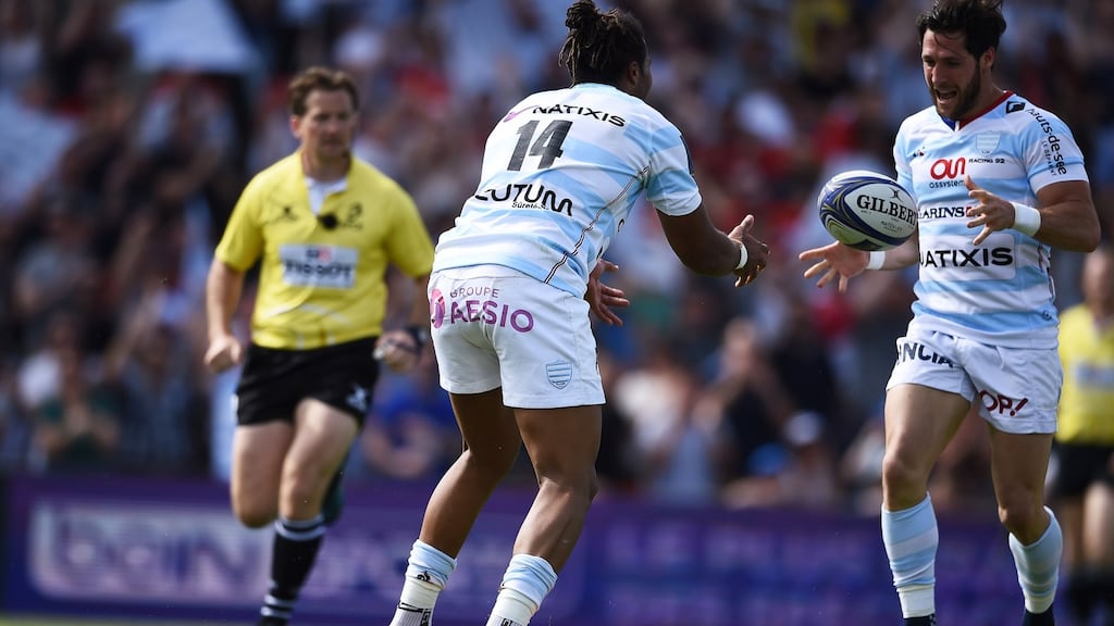 Racing 92 winger Teddy Thomas passes the ball to his captain Maxime Machenaud to score their third try in the Champions Cup semi-final at the Stade Chaban-Delmasin Bordeaux. Photograph: Nicolas Tucat/AFP/Getty Images