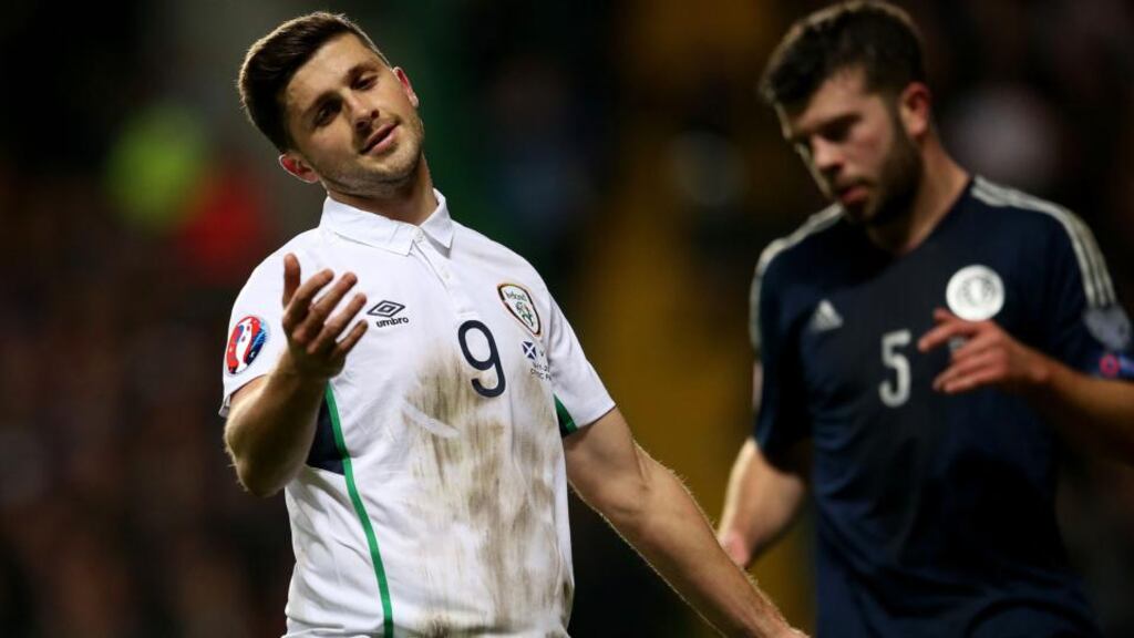 Shane Long reacts to a missed chance at Celtic Park last night. Photograph: INPHO/James Crombie