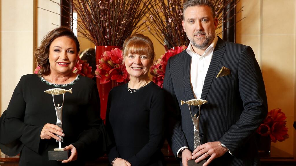 Tina Roche of the Community Foundation for Ireland, centre, with businesswoman Norah Casey, and Mark Prentice of Bord Gáis Energy. Photograph: Jason Clarke.