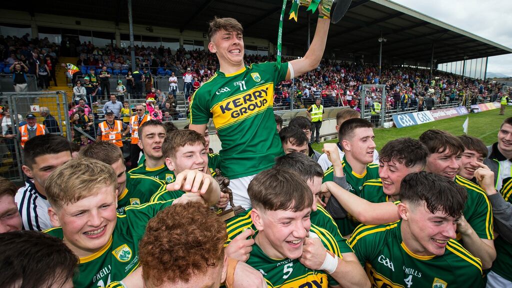 David Clifford and the Kerry players celebrate with the Munster title. Photograph: Cathal Noonan