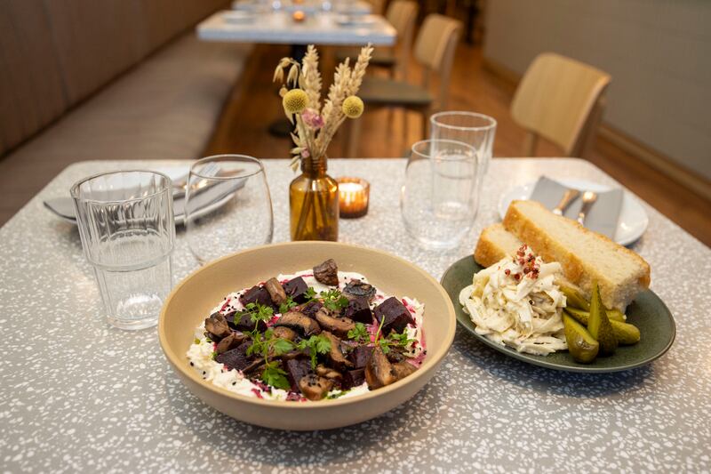 Home-made bread is on hand to mop up every delicious drop and there’s also a dish of parsnip remoulade. Photograph: Tom Honan