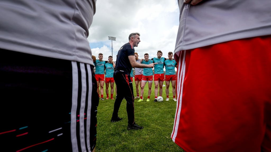Rory Gallagher speaks to his Derry players. Photo: Inpho