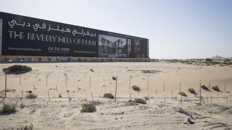 “The Beverly Hills of Dubai” is the only banner remaining at the Damac Properties’ Akoya after a billboard with a picture of Donald Trump on it was removed. Photo: Getty Images