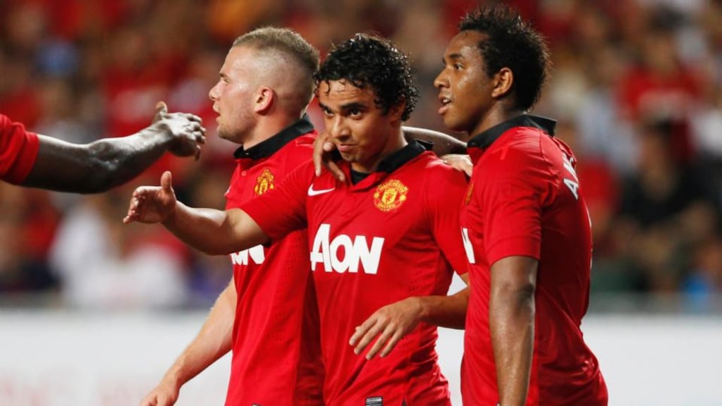 Manchester United’s Fabio Da Silva (C) celebrates with team-mates after scoring a goal against   Kitchee during their friendly match  in Hong Kong. Photograph: Bobby Yip/Reuters