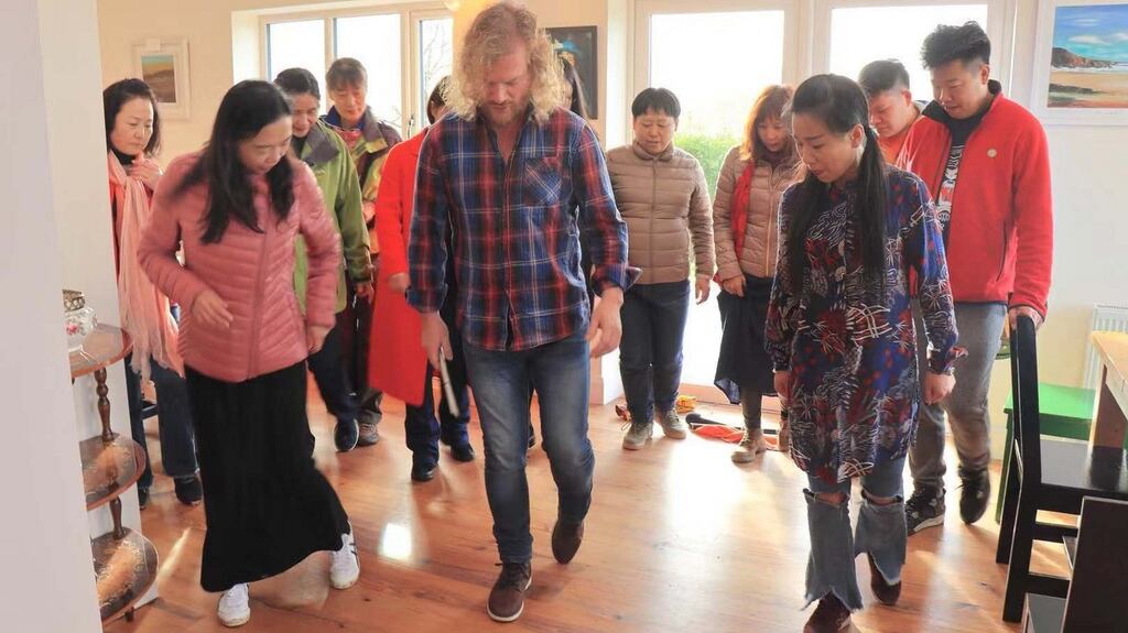 Musician Brendan Keegan delivering a a sean nós dance class to Chinese guests at Glen Keen Farm, Co Mayo. Thousands of Chinese visitors have been to the facility since 2014.
