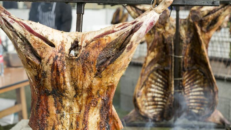 Whole lambs on the grill