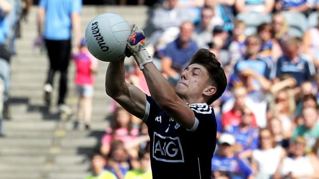 Evan Comerford punches the ball away after coming on for Stephen Cluxton the last day. Photo: Bryan Keane/Inpho