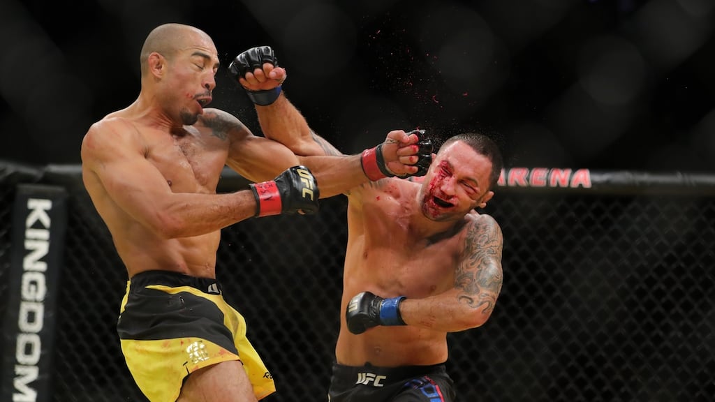 Jose Aldo punches Frankie Edgar during the featherweight title bout at the UFC 200 event at T-Mobile Arena   in Las Vegas, Nevada. Photograph: Rey Del Rio/Getty Images