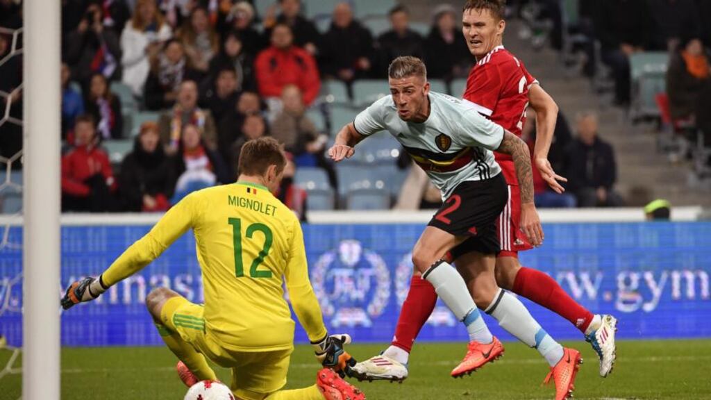Russia’s  Alexander Bukharov scores a stoppage-time equaliser past  Belgium goalkeeper Simon Mignolet during an international friendly  at the Fisht Arena in Sochi. Photograph:  Alexander Nemenov/AFP/Getty Images