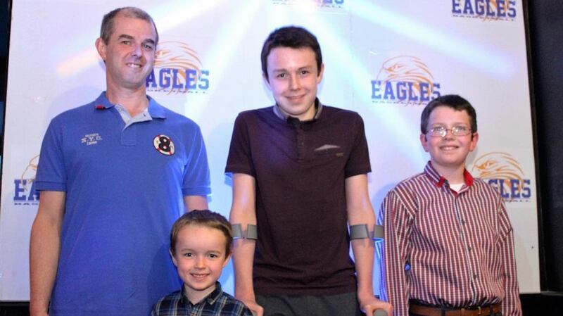 Alan Hawe with his sons Ryan (6), Liam(13) and Niall (11).