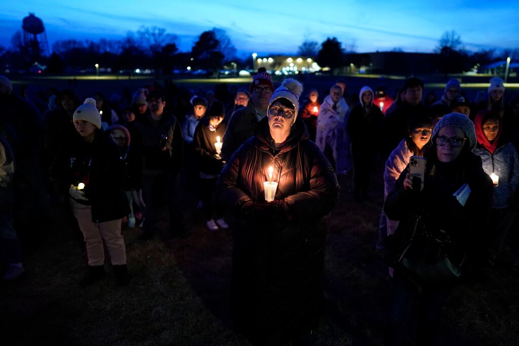 A candlelight vigil was held following a shooting at Perry High School in Iowa. Photograph: AP