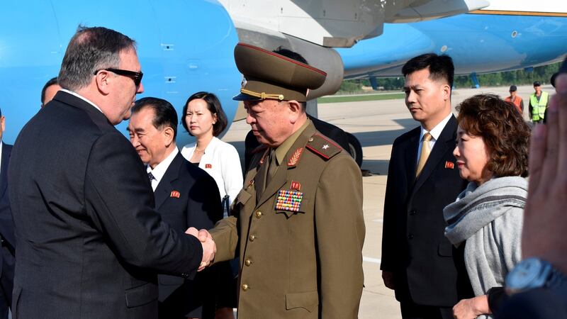 US secretary of state Mike Pompeo being greeted by an unidentified North Korean general on arrival in Pyongyang, North Korea. Photograph:  Matthew Lee/Pool via Reuters