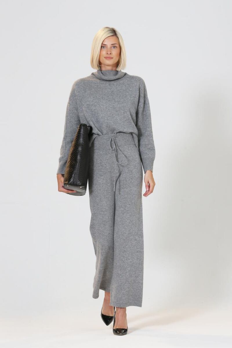 Grey cashmere sweater (€259), lounge pants (€229), tote (€349), from Theo+George