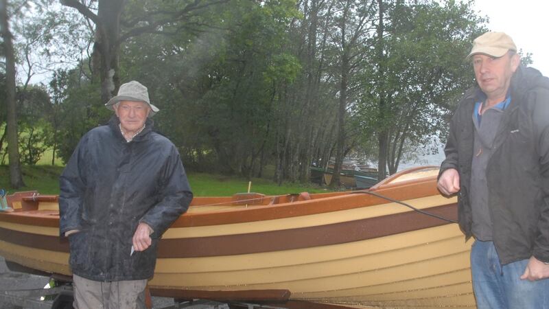 Frank Fox (right) winner of the 19ft lake boat raffle in aid of North Westmeath Hospice, with Tommy Fagan, chairman of Lough Lene Anglers’ Association