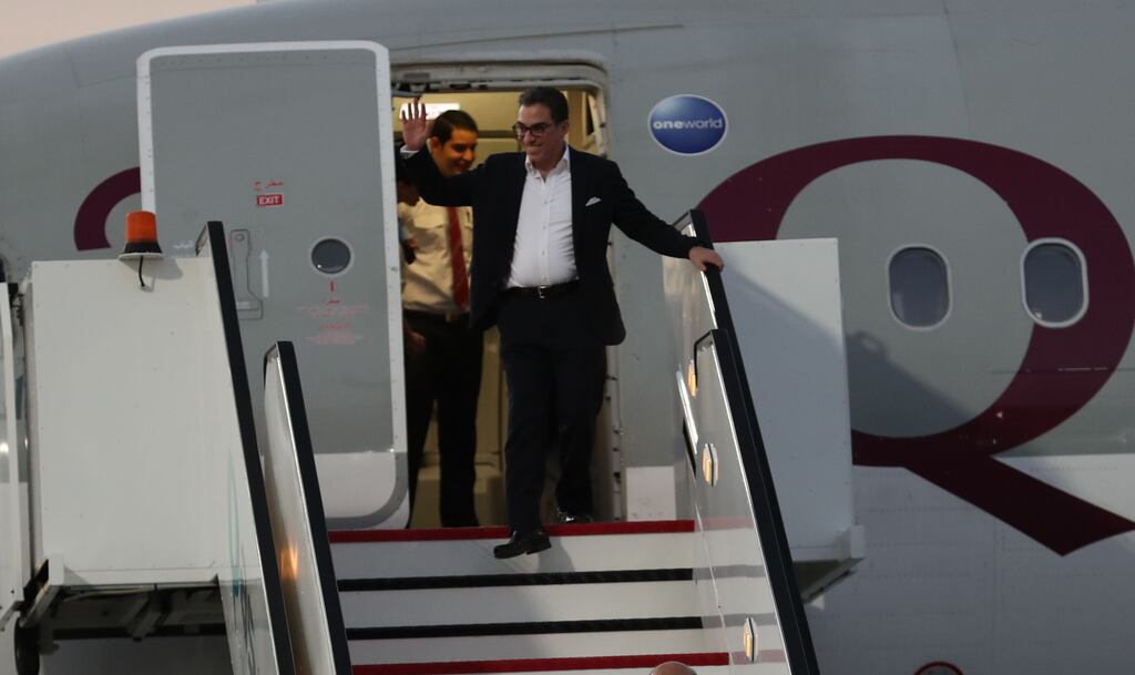 US national Siamak Namazi, who was among five prisoners released from Iran, disembarks from a plane upon landing in Doha, Qatar, on Monday. Photograph: EPA