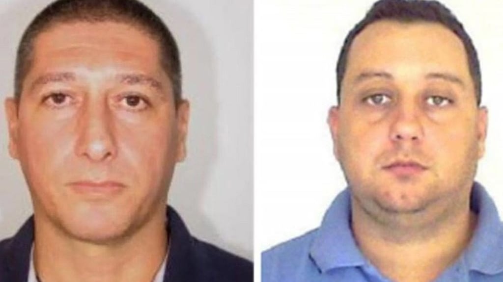 Ronnie Lessa (left) and Elcio Vieira de Queiroz, two former police officers now under arrest as suspects in the 2018 execution of a Rio de Janeiro councilwoman. Photograph: Rio De Janeiro Police via The New York Times