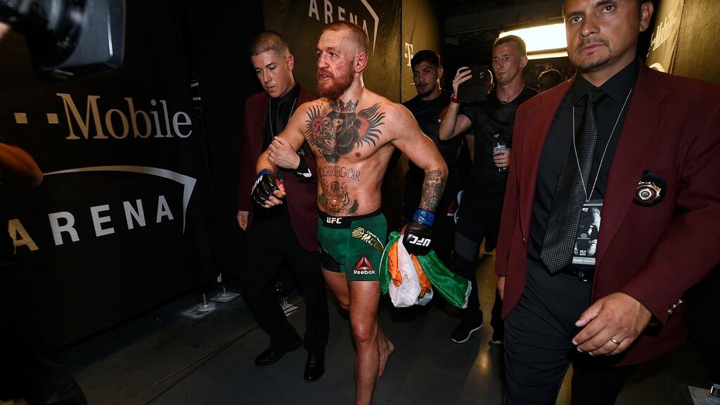 Conor McGregor suffered injuries to his left foot during UFC 202. Photograph: Getty Images