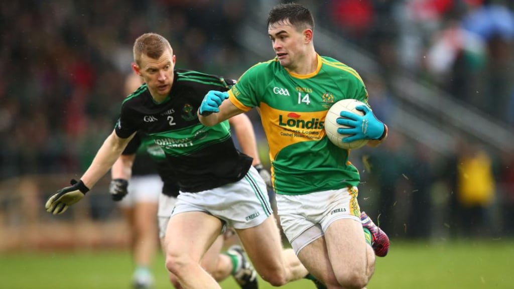 Michael Quinlivan of Clonmel Commercials in action against Nemo Rangers’ Aidan O’Reilly during the AIB Munster Club Senior Football Championship Final in Mallow. Photograph: James Crombie/Inpho