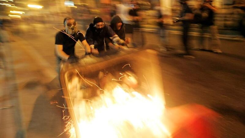 Clashes break out during an anti-fascist demonstration in Athens. Greece’s two largest unions in the public sector and in the private sector called on people to join a large rally against fascism and to call for sanctions against the extreme right Golden Dawn party. Photograph: Milos Bicanski/Getty Images