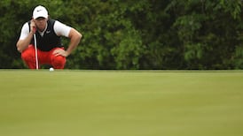 Rory McIlroy signs off with a half in Texas