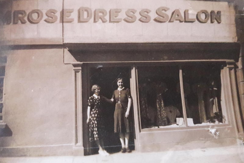 Trouble ahead: my grandmother and her friend in 1952, in the doorway of their new clothes shop, Primrose Dress Salon