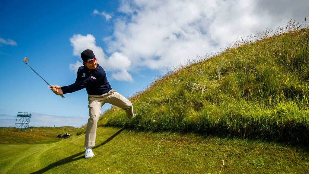 Jake McLeod plays a trick shot on the 5th hole during a practice day ahead of the 2019 Irish Open at Lahinch. Photo: Oisin Keniry/Inpho